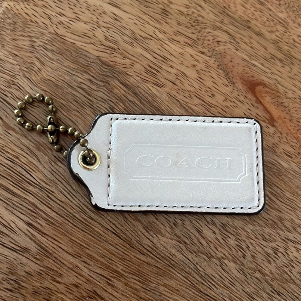 Coach white Stamped Leather Hang Tag